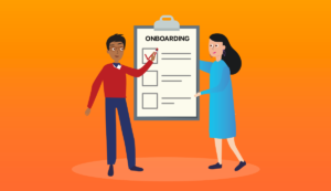 Two people holding up an onboarding checklist