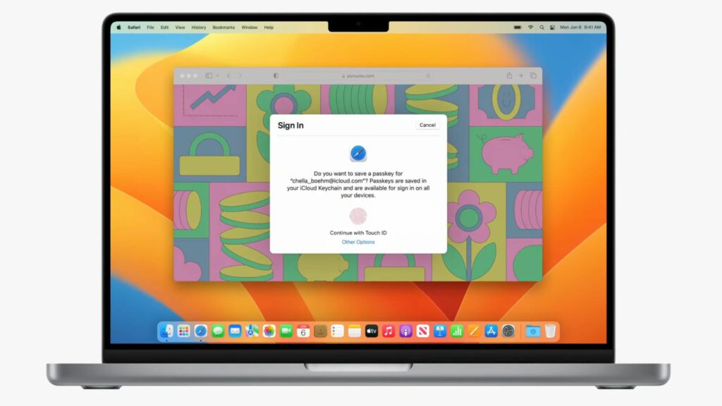 Picture of a MacBook. On the screen there is a Sign in window asking to input the Touch ID to add a passkey in the  macOS Ventura feature.